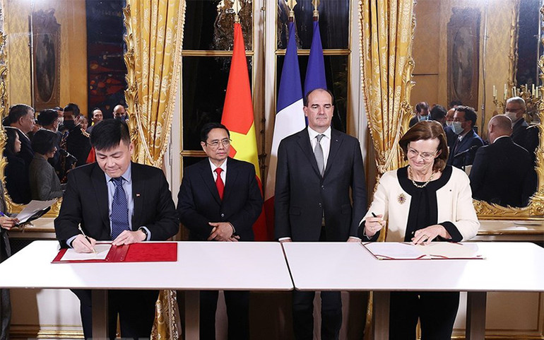Thủ tướng Việt Nam và Pháp chứng kiến lễ ký các văn kiện hợp tác -0