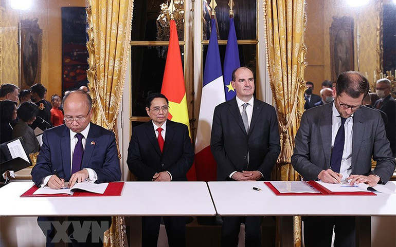 Thủ tướng Việt Nam và Pháp chứng kiến lễ ký các văn kiện hợp tác -0