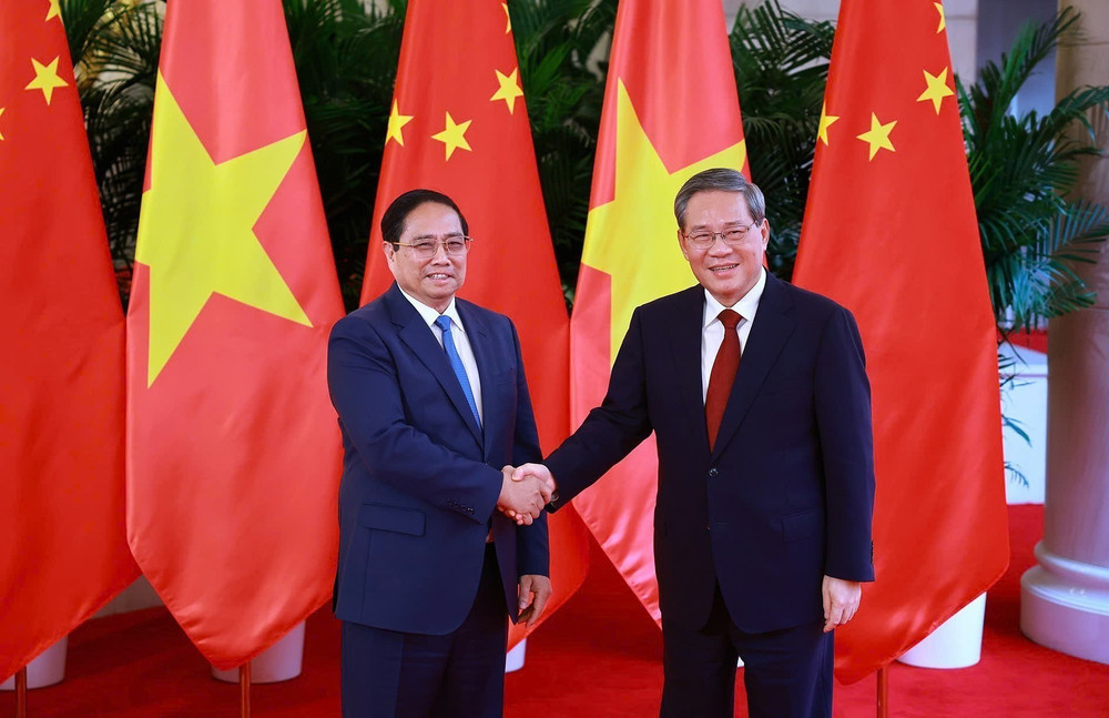 Thủ tướng Phạm Minh Chính với Thủ tướng Trung Quốc Lý Cường. 244.jpg
