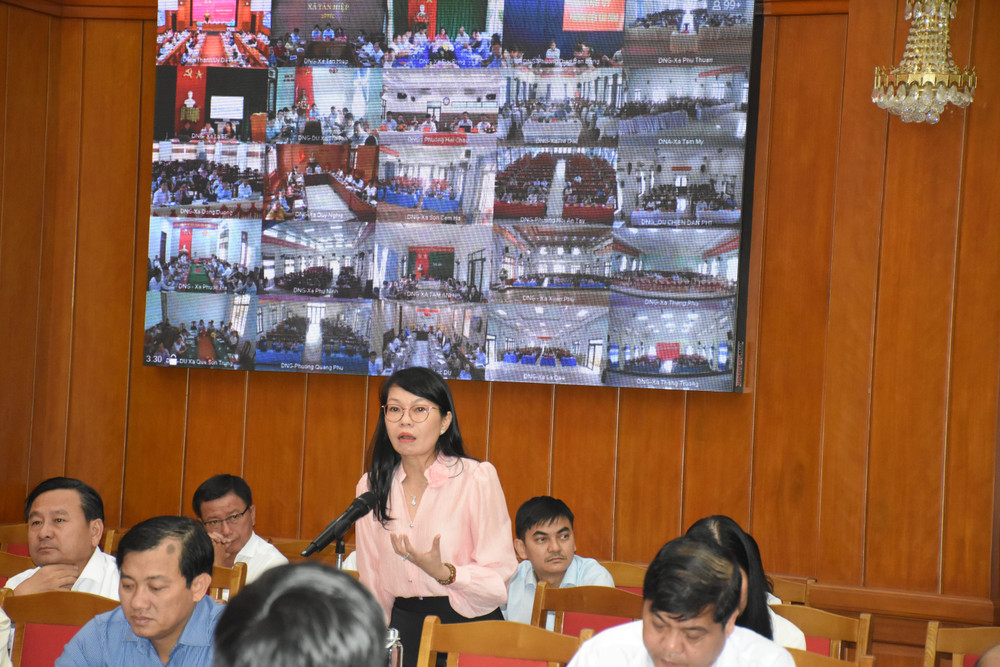 Giám đốc Sở Tài chính thành phố Đà Nẵng Trần Thị Thanh Tâm phát biểu, làm rõ thêm về các kiến nghị, đề xuất tại các điểm cầu trực tuyến. (Ảnh: ANH ĐÀO) dsc-1091.jpg