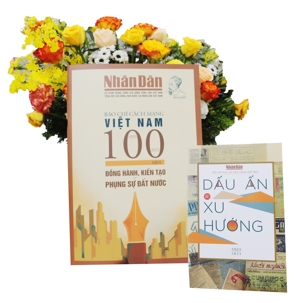 Hai ấn phẩm đặc biệt của Báo Nhân Dân. (Ảnh LÊ MINH) a1.jpg