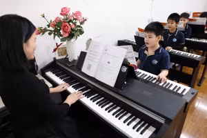 Dạy âm nhạc trong trường học. (Ảnh minh họa: ĐẠI THẮNG)