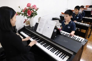 Dạy âm nhạc trong trường học. (Ảnh minh họa: ĐẠI THẮNG)