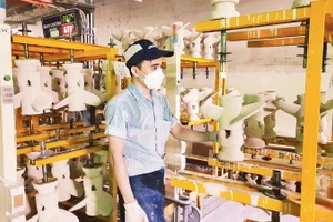 Hoạt động sản xuất tại Công ty TNHH Juki Việt Nam, Khu chế xuất Tân Thuận, Thành phố Hồ Chí Minh.