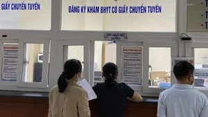 Chính sách bảo hiểm y tế hướng tới giảm mạnh chi tiền túi của người bệnh. (Ảnh: ĐỖ THOA)