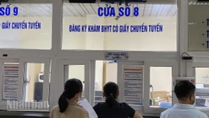 Từ 1/7, người tham gia bảo hiểm y tế 5 năm liên tục được hưởng nhiều quyền lợi. (Ảnh: ĐỖ THOA)