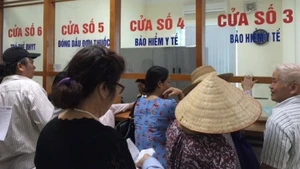 Hai nhóm đối tượng được tăng mức hưởng khám, chữa bệnh bảo hiểm y tế lên 100% từ năm 2026. (Ảnh minh họa)