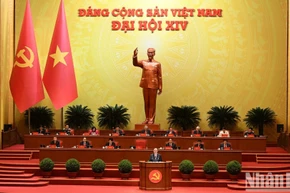 Tổng Bí thư Tô Lâm Báo cáo về các văn kiện trình Đại hội XIV Đảng Cộng sản Việt Nam tại phiên khai mạc Đại hội đại biểu toàn quốc lần thứ XIV Đảng Cộng sản Việt Nam. (Ảnh: TRẦN HẢI)