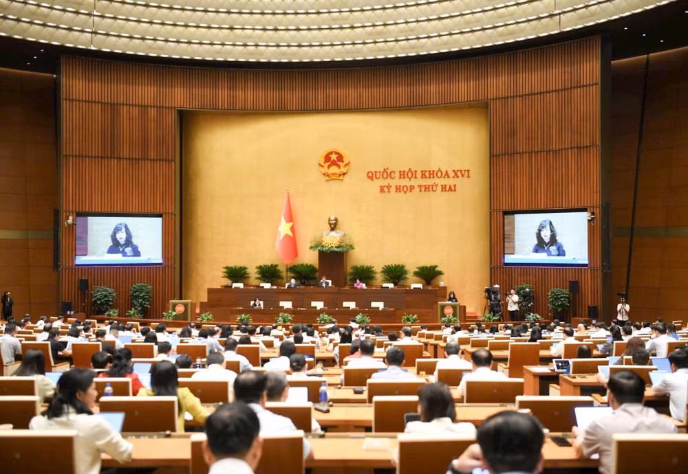 Phiên họp Quốc hội tại hội trường nghe trình bày Tờ trình, Báo cáo thẩm tra về các dự án Luật. (Ảnh: ĐĂNG ANH)