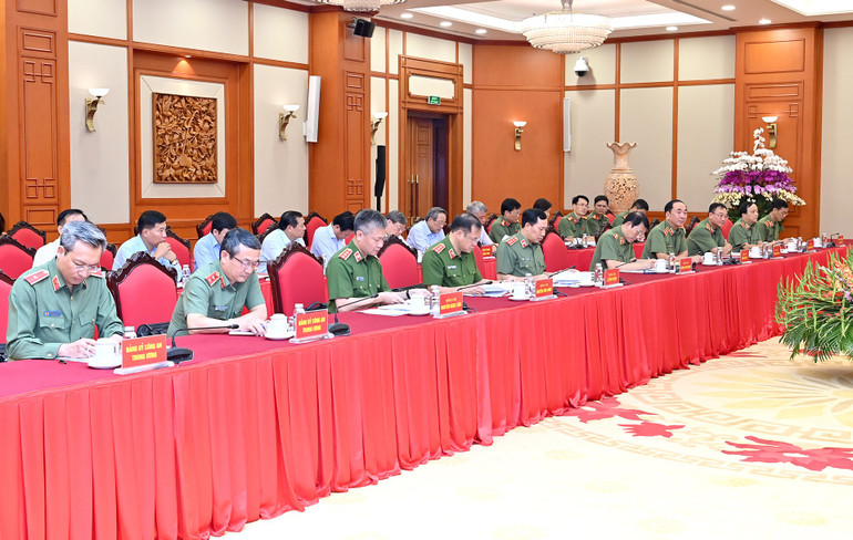 Ban Thường vụ Đảng ủy Công an Trung ương tham dự cuộc làm việc. (Ảnh: ĐĂNG KHOA) a7-bnd-3233.jpg