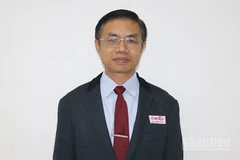 Đồng chí Syvanh Homxaiyaded, quyền Tổng Biên tập báo Pasaxon (Tiếng nói của Trung ương Đảng Nhân dân Cách mạng Lào). (Ảnh: TRỊNH DŨNG)