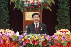 Đồng chí Thongloun Sisoulith tiếp tục được Đại hội tín nhiệm bầu giữ chức Tổng Bí thư khóa XII, nhiệm kỳ 2026-2030. (Ảnh: TRỊNH DŨNG)