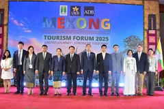 Các đại biểu tại lễ khai mạc Diễn đàn. (Ảnh: HẢI TIẾN)