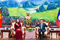Tổng Bí thư, Chủ tịch nước Lào Thongloun Sisoulith và Phó Chủ tịch nước Võ Thị Ánh Xuân. (Ảnh: HẢI TIẾN)