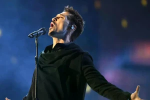 Ca sĩ Dima Bilan giành giải Nam ca sĩ của năm. (Ảnh: RIA NOVOSTI)