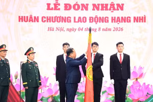 Hội Nạn nhân chất độc da cam/dioxin Việt Nam đón nhận Huân chương Lao động hạng Nhì. (Ảnh: VŨ DUY)