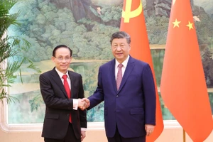 Đồng chí Lê Hoài Trung, Ủy viên Bộ Chính trị, Bí thư Đảng ủy, Bộ trưởng Ngoại giao, Đặc phái viên của Tổng Bí thư Tô Lâm với Tổng Bí thư, Chủ tịch nước Tập Cận Bình.