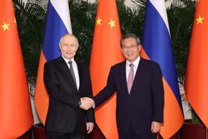 Thủ tướng Lý Cường và Tổng thống Putin. (Ảnh: Tân Hoa xã)
