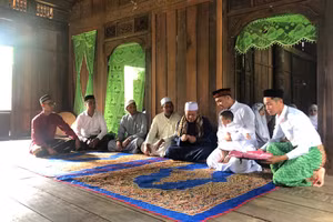 Nghi lễ cắt tóc và đặt tên cho trẻ của người Chăm Islam.