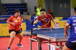 Nguyễn Anh Tú kết hợp cùng Mai Hoàng Mỹ Trang trở thành một bộ đôi nam nữ rất mạnh. (Ảnh: DUY LINH)