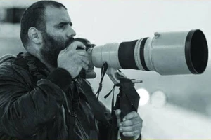 Phóng viên ảnh Khalid Al-Misslam. (Ảnh: Gulf Times)