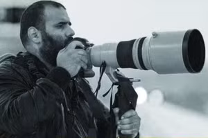Phóng viên ảnh Khalid Al-Misslam. (Ảnh: Gulf Times)