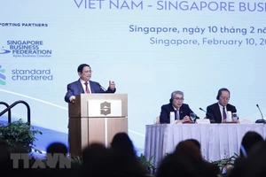 Thủ tướng Phạm Minh Chính phát biểu tại Diễn đàn Doanh nghiệp Việt Nam-Singapore. (Ảnh: TTXVN)