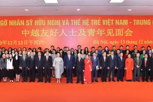 Tổng Bí thư Nguyễn Phú Trọng và Phu nhân, Tổng Bí thư, Chủ tịch Trung Quốc Tập Cận Bình và Phu nhân cùng các đại biểu tham dự Gặp gỡ nhân sĩ hữu nghị và thế hệ trẻ Việt Nam-Trung Quốc năm 2023. (Ảnh: nhandan.vn)