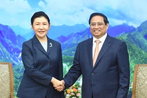 Thủ tướng Phạm Minh Chính đón Bộ trưởng Tư pháp Trung Quốc Hạ Vinh.