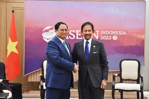 Thủ tướng Phạm Minh Chính và Quốc vương Brunei Darussalam Sultan Haji Hassanal Bolkiah. (Ảnh: TUẤN ANH)
