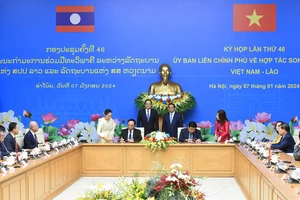 Quang cảnh lễ kiến ký biên bản Kỳ họp lần thứ 46 Ủy ban liên Chính phủ về hợp tác song phương Việt Nam-Lào.