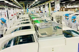 Lao động tại Khu công nghiệp sinh thái DEEP-C Hải Phòng (Khu kinh tế Ðình Vũ-Cát Hải). (Ảnh minh họa: NGÔ QUANG DŨNG)