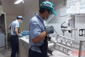 Lao động tại doanh nghiệp trong khu chế xuất Tân Thuận, Thành phố Hồ Chí Minh (Ảnh minh họa: nhandan.vn).