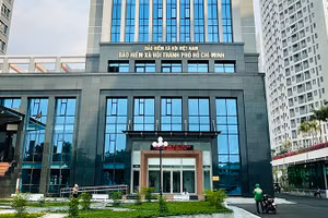 Bảo hiểm xã hội tỉnh tiếp nhận hồ sơ và trả kết quả xác nhận thời gian đóng bảo hiểm xã hội của người lao động khi doanh nghiệp mất khả năng đóng. (Ảnh minh họa: Trụ sở Bảo hiểm xã hội Thành phố Hồ Chí Minh)