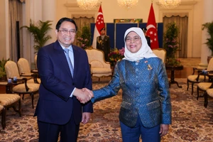 Thủ tướng Phạm Minh Chính hội kiến Tổng thống Cộng hòa Singapore Halimah Yacob. (Ảnh: NHẬT BẮC)