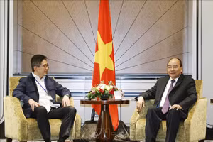 Chủ tịch nước Nguyễn Xuân Phúc tiếp Chủ tịch Phòng Thương mại và Công nghiệp Indonesia Arsjad Rasjid. (Ảnh: Thống Nhất/TXVN)