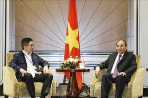 Chủ tịch nước Nguyễn Xuân Phúc tiếp Chủ tịch Phòng Thương mại và Công nghiệp Indonesia Arsjad Rasjid. (Ảnh: Thống Nhất/TXVN)