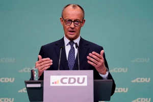 Ông Friedrich Merz trong cuộc họp báo sau khi giành chiến thắng.