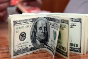Đồng USD. (Ảnh: AFP/TTXVN)