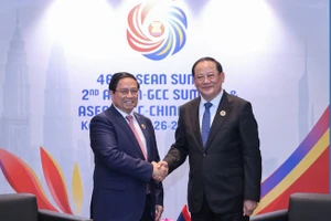 Thủ tướng Phạm Minh Chính và Thủ tướng Lào Sonexay Siphandone. (Ảnh: VGP/Nhật Bắc)
