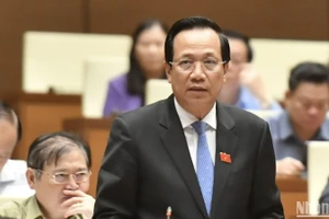 Bộ trưởng Lao động-Thương binh và Xã hội Đào Ngọc Dung trả lời chất vấn của đại biểu Quốc hội. (Ảnh: ĐĂNG KHOA) 