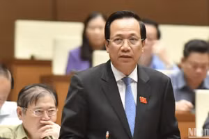 Bộ trưởng Lao động-Thương binh và Xã hội Đào Ngọc Dung trả lời chất vấn của đại biểu Quốc hội. (Ảnh: ĐĂNG KHOA) 