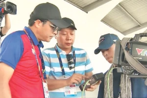 Phóng viên VTV tác nghiệp tại Sea Games 31. Ảnh: Hoài Thu