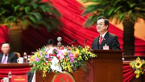 Đồng chí Lê Hồng Quang, Ủy viên Trung ương Đảng, Phó Chánh án Thường trực Tòa án nhân dân tối cao trình bày tham luận. Ảnh: tuấn anh - DUY LINH