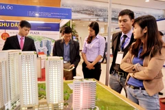 Khi niềm tin thị trường được củng cố, các doanh nghiệp bất động sản có thể huy động vốn với chi phí hợp lý hơn. Ảnh: NAM ANH