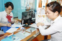 Thị trường tài chính tiêu dùng Việt Nam thu hút sự quan tâm đặc biệt từ các nhà đầu tư nước ngoài. Ảnh: NGUYỆT ANH