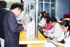 Nhiều công ty chứng khoán đã phải tính đến phương án tăng vốn điều lệ để duy trì tăng trưởng. Ảnh: NAM ANH