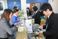 Tín dụng bất động sản có thể tạo lực đẩy cho thị trường trong ngắn hạn. Ảnh: NAM ANH