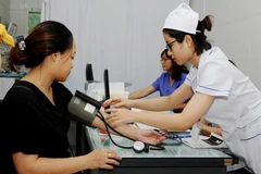 Quyền lợi của người bệnh được bảo đảm khi tham gia Bảo hiểm y tế. Ảnh: SONG ANH