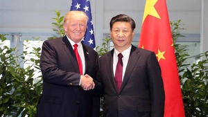Chủ tịch Trung Quốc Tập Cận Bình và Tổng thống Mỹ Donald Trump gặp bên lề Hội nghị thượng đỉnh G20 tại Đức, năm 2017. (Ảnh: Tân Hoa Xã)